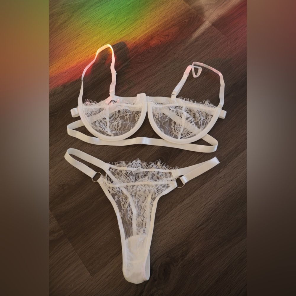 two-piece lingerie set in a crisp white color size medium